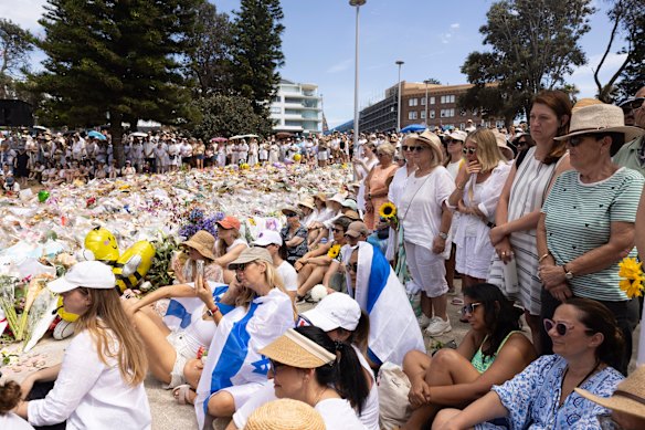 Women from all backgrounds gather at Bondi Beach to mark one week since the Hanukkah terror attack and honour the victims. 
