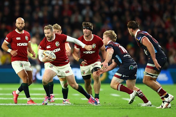 Elliot Daly of the British & Irish Lions makes a break