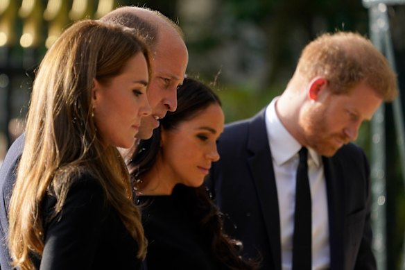 Princess Catherine and Prince William with Meghan, the Duchess of Sussex, and Prince Harry outside Windsor Castle in 2022. 