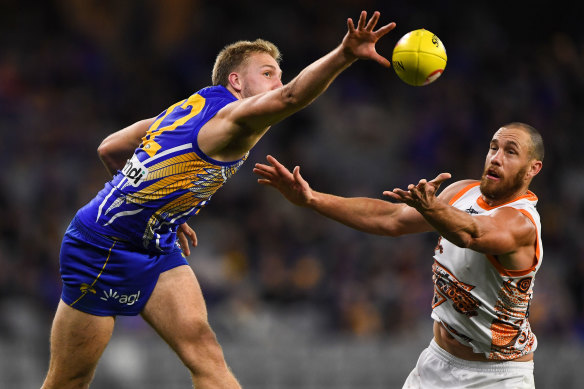 Oscar Allen and Shane Mumford compete during the Eagles' 12-point AFL win over GWS in Perth on Sunday.