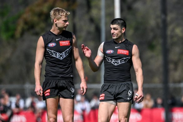Billy Frampton (left) with Brayden Maynard at Collingwood’s final training session before the grand final.