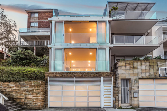 Designer Wayne Cooper is committed to selling his Tamarama home.