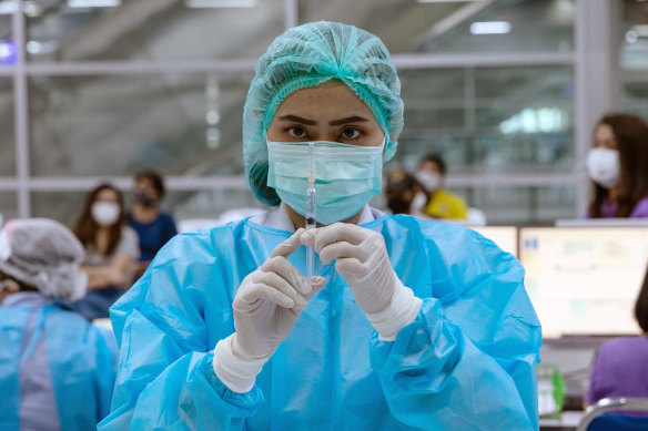 A health worker prepares to administer a dose of the Sinovac COVID-19 vaccine in Bangkok last week.