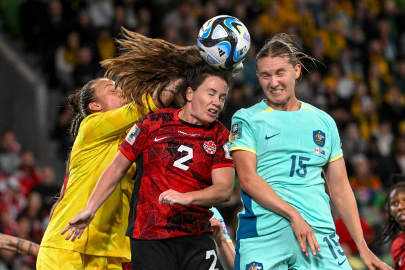 Clare Hunt (right) in action against Canada on Monday night.