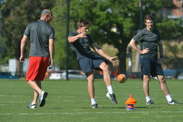 Nathan Chapman (left) oversees a Prokick clinic in Melbourne. His company trains athletes to make it in the American college system.