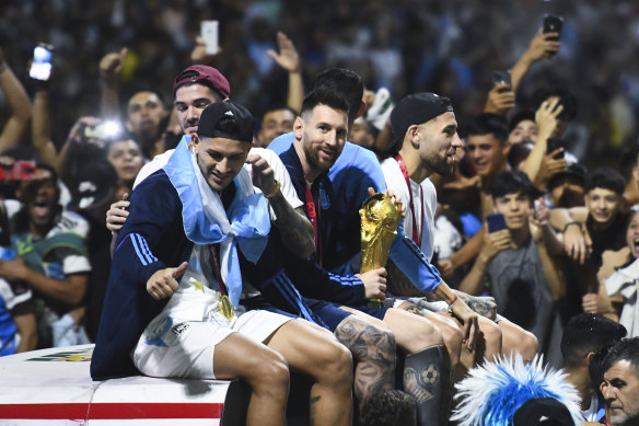 Lionel Messi of Argentina smiles to the fans during the caravan of the Argentina men’s national football team after winning the FIFA World Cup Qatar 2022.