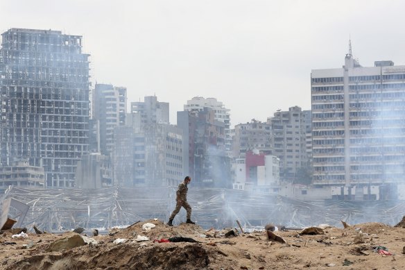 A soldier walks amid the devastation of the August 4 blast in the port of Beirut.