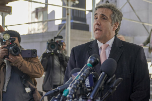 Donald Trump’s former lawyer and fixer Michael Cohen speaks to reporters after a second day of testimony before a grand jury on March 15 in New York.