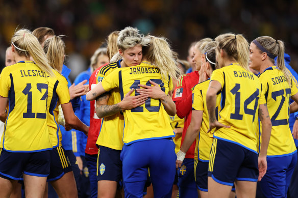 The Swedish team celebrates after defeating Australia 2-0 in Brisbane.