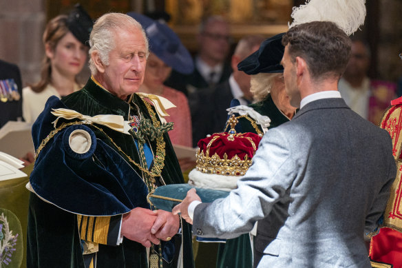 The Crown of Scotland borne by The Duke of Hamilton and Brandon is presented to King Charles III.