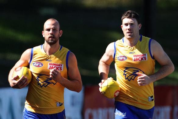 Hitting the track: Eagles Will Schofield (left) and Jeremy McGovern.