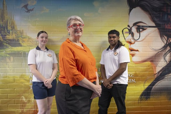 Principal at Sarah Redfern High School in Minto, Lyndy Clowry, with senior students.