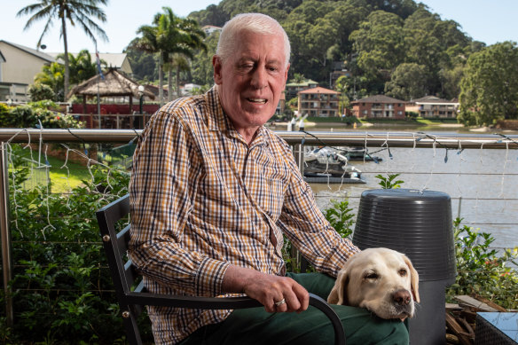 Graeme Innes, with his dog, says taxis too often refuse people with assistance animals.