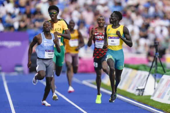 Bol checks out the competition as he glides through his heat.