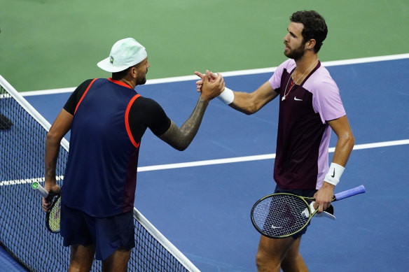 Karen Khachanov, right, after eliminating Nick Kyrgios from last year’s US Open.