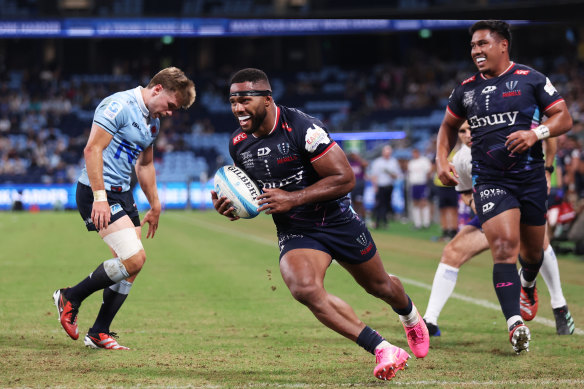 Filipo Daugunu scores for the Rebels in a win over the Waratahs in March.