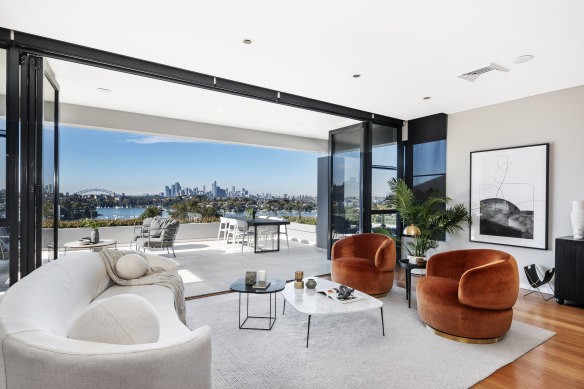 The five-bedroom house across three levels has views of Sydney Harbour.