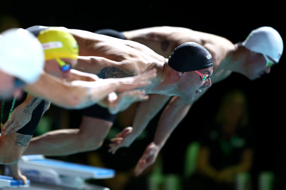 Cam McEvoy and the men’s 50m freestyle field off the blocks.