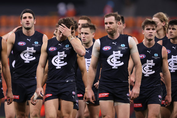 Blues players look dejected after losing to the Giants.