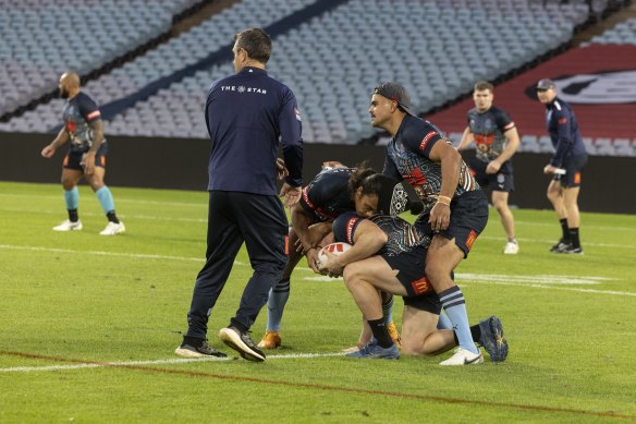 Latrell Mitchell cut short a training session on Sunday evening.