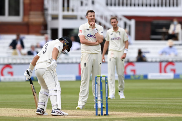 Ollie Robinson of England reacts after the failed appeal for the wicket of Ross Taylor.