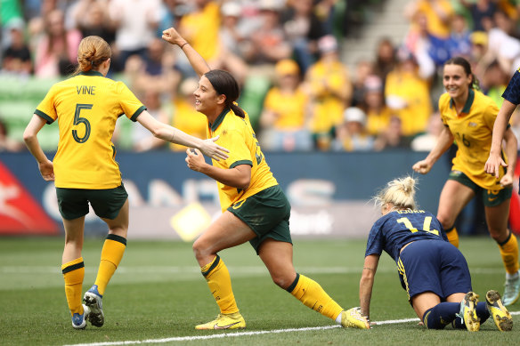 Sam Kerr celebrates a goal against Sweden.