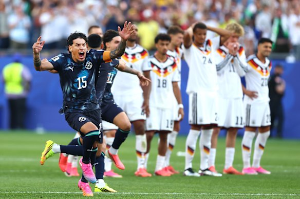 Paraguay’s Gustavo Gomez celebrates Jose Canale’s winning penalty.