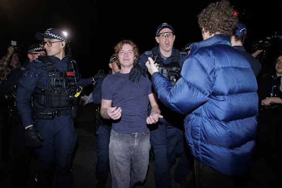 Police removed prominent neo-Nazi Michael Nelson from protests outside a One Nation fundraiser.