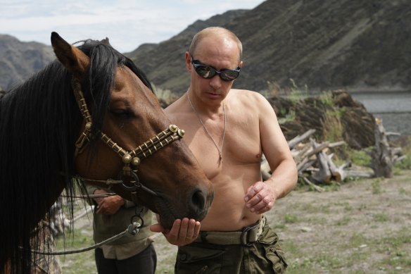 Russian President Vladimir Putin in one of his famous bare-chested poses.