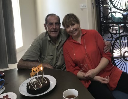 Allan Wells celebrates at home with his daughter Jamelle on his last birthday on March 18, 2019.