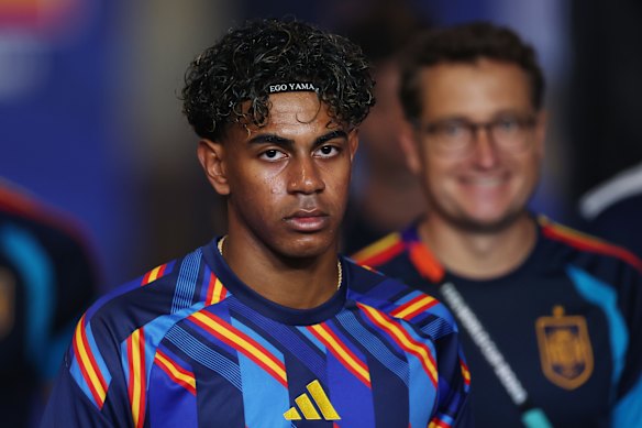 Lamine Yamal looks on from the tunnel before the match between Spain and Austria.