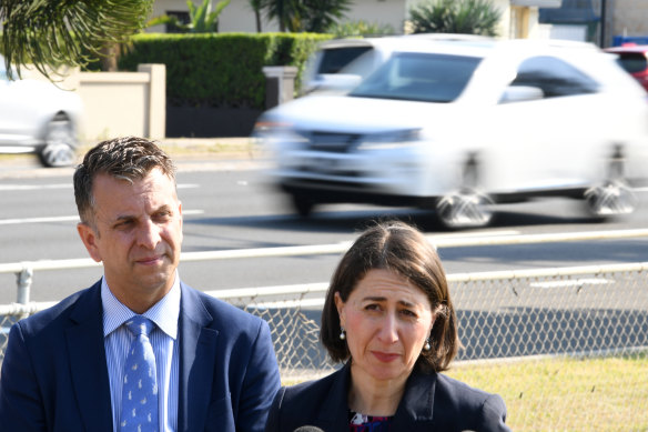 Waiting game: Premier Gladys Berejiklian with the Minister for Transport and Roads, Andrew Constance. 
