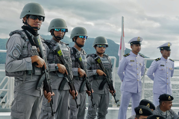 Indonesian coast guards prepare to patrol the North Natuna Sea.