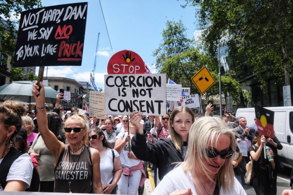 Protesters carrying signs.