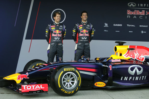 Former Red Bull teammates Sebastian Vettel and Daniel Ricciardo in 2014.