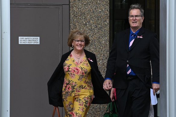 Greg Simms (right) the brother of Lynette Dawson with his wife Merilyn Simms (left) leave the Law Courts building in Queens Square on Friday.