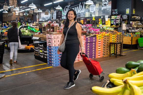 Maida Pineda takes her shopping trolley to the South Melbourne market.