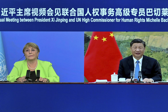 Chinese President Xi Jinping, right, holds a virtual meeting with United Nations High Commissioner for Human Rights Michelle Bachelet. 