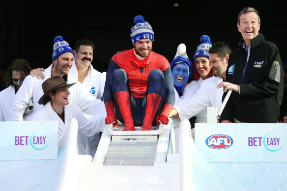 Dane Swan goes down the slide two years ago.