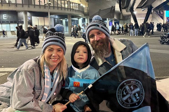 Kat, Archie and Aaron Perus celebrate Melbourne City’s win.
