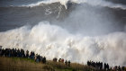 Andrew Cotton surfs Nazare’s north beach.