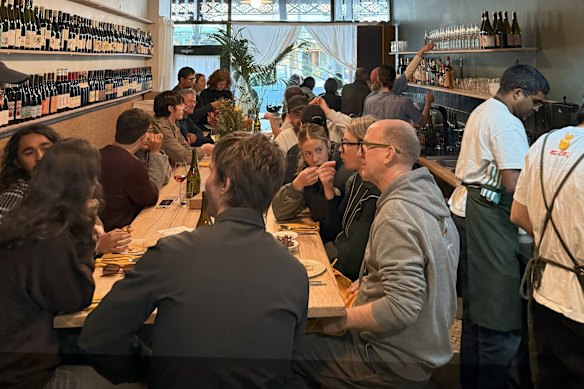A large communal table is the focal point of the room.