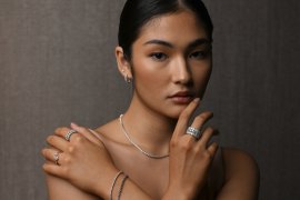 Model Kristena Seedwell wears a selection of Michael Hill’s new range of lab-grown diamond jewellery at the company’s head office in Brisbane.
