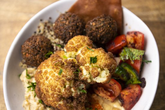 The Khamsa Cafe Jerusalem Bowl with hummus, baba ghanoush, quinoa, fattoush, falafel and cauliflower. 