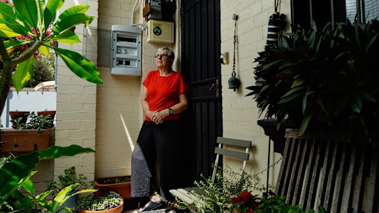 Jane Fisher installed solar panels to cut her bills, but would not add a battery if her network charge increased.