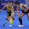 Australia’s Ambrosia Malone and Japan’s Yukari Mano vie for possession on Wednesday night.