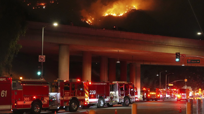 Aerial attack helps control LA fires but San Diego now a ‘red flag’