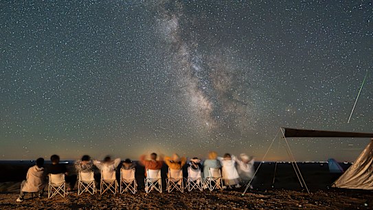 Stargazers watch the Perseid meteor shower at  Dahongshan in China’s Inner Mongolia region.