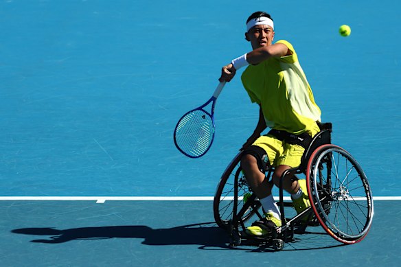 Tokito Oda hits a strong forehand.