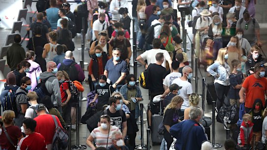 Domestic passengers faced long queues at Sydney Airport early on Saturday afternoon.